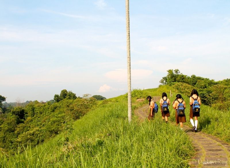 Kids walking along Campuhan Ridge walk in Ubud, Bali