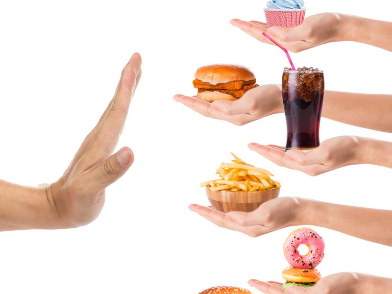 hand saying no to junk food