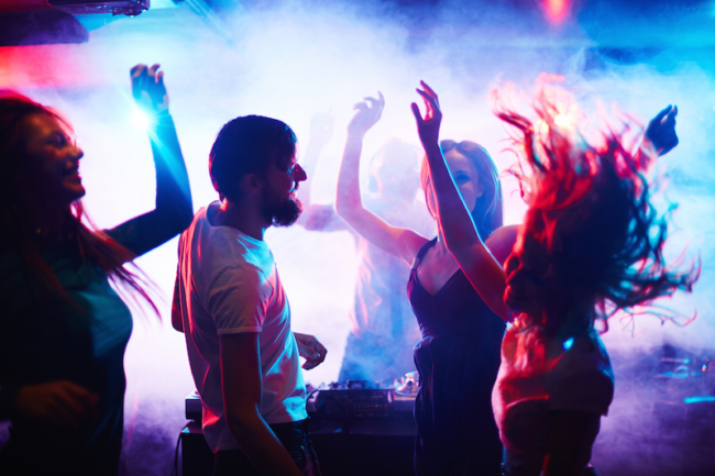 Young people dancing in nightclub, music, dance festival