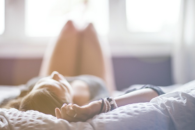 woman lying in bed