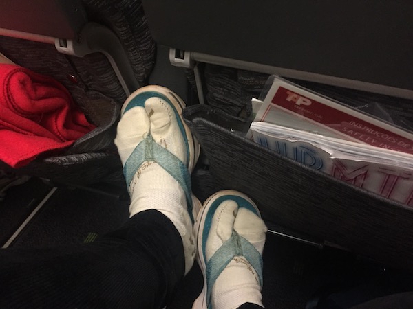 toe socks on plane, travelling tips for girls