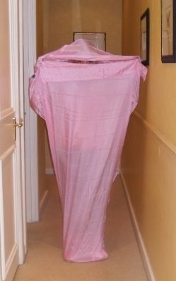 Anya Andreeva in a pink silk sleeping bag