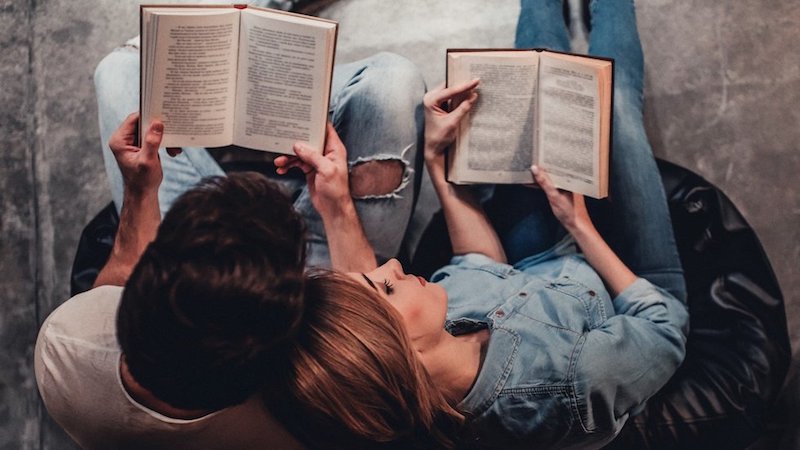 couple reading together in love