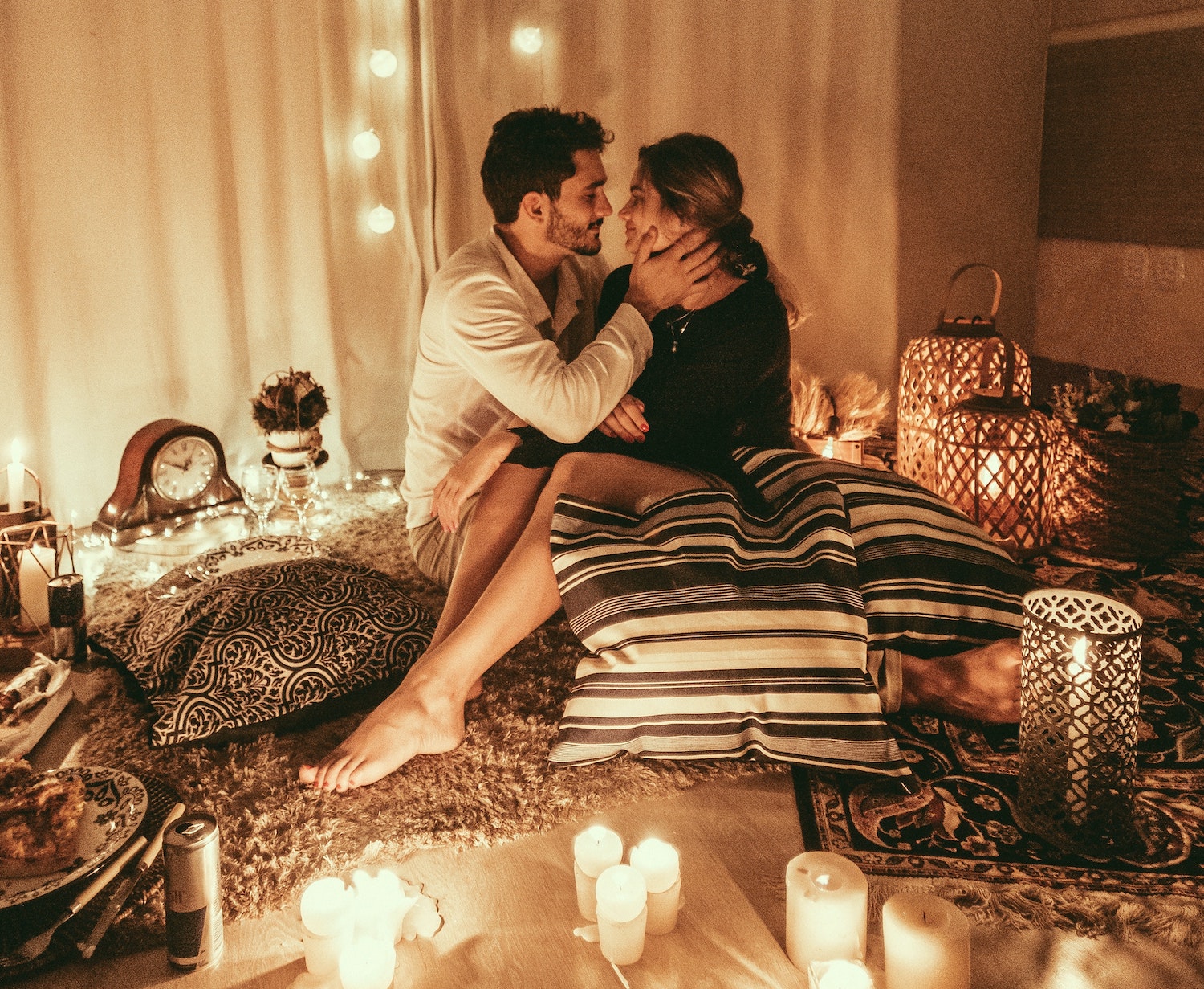 couple about to kiss, in love, tantric ritual, candles, romantic